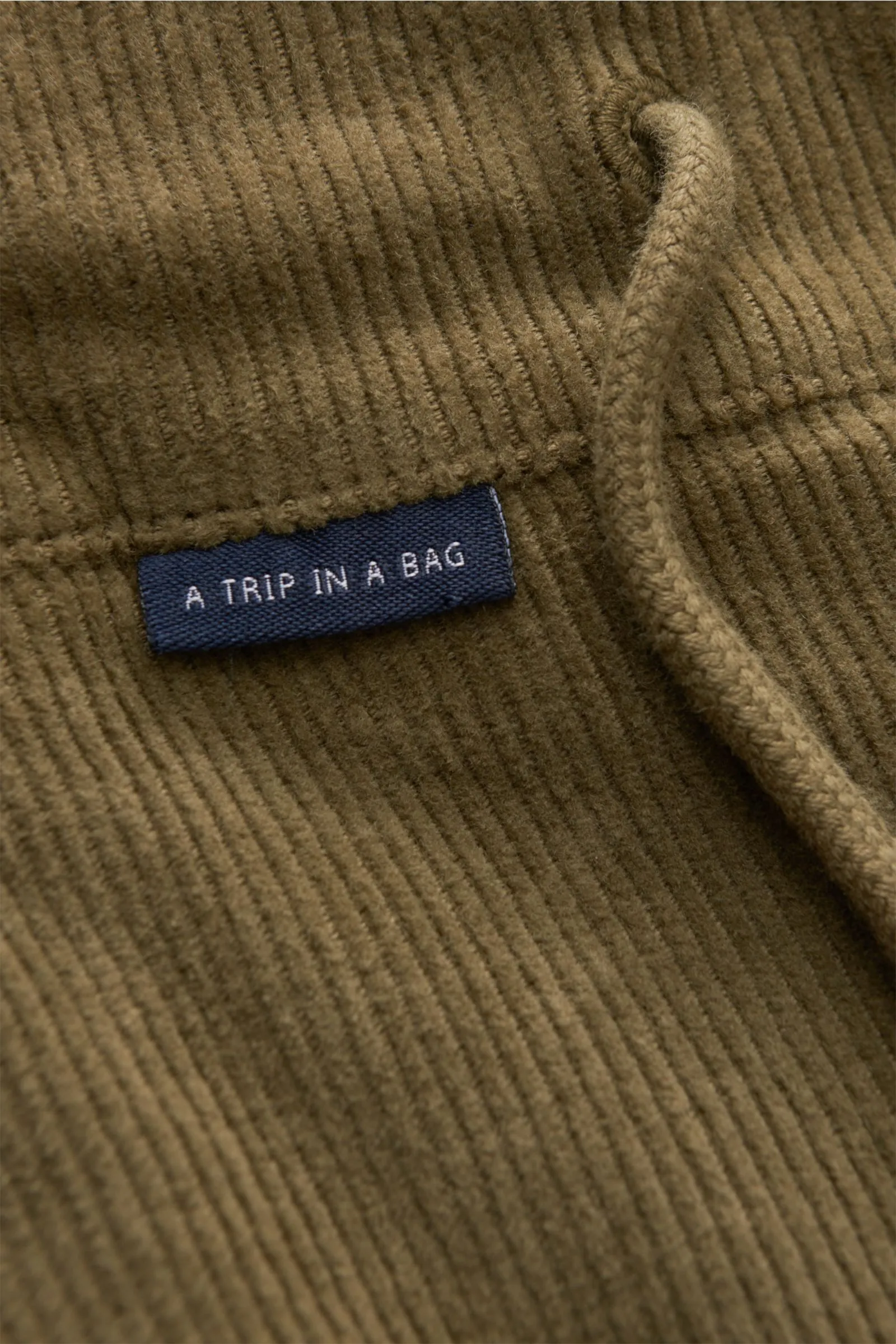 04651/ A TRIP IN A BAG corduroy jogger pants 'Smart Cord Cargo' olive