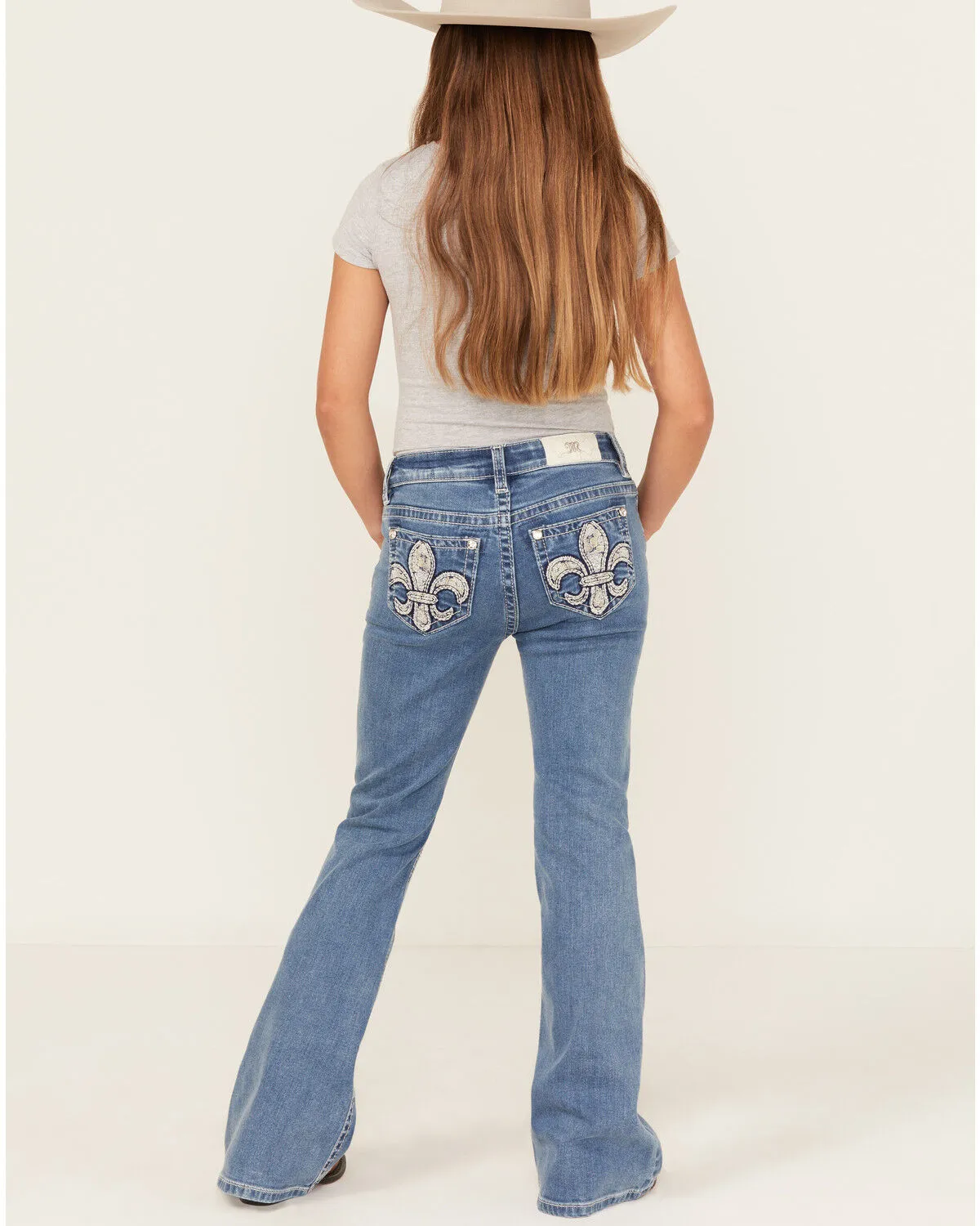 Product Name:  Miss Me Girls' Medium Wash Fleur de Lis Pocket Flare Stretch Denim Jeans