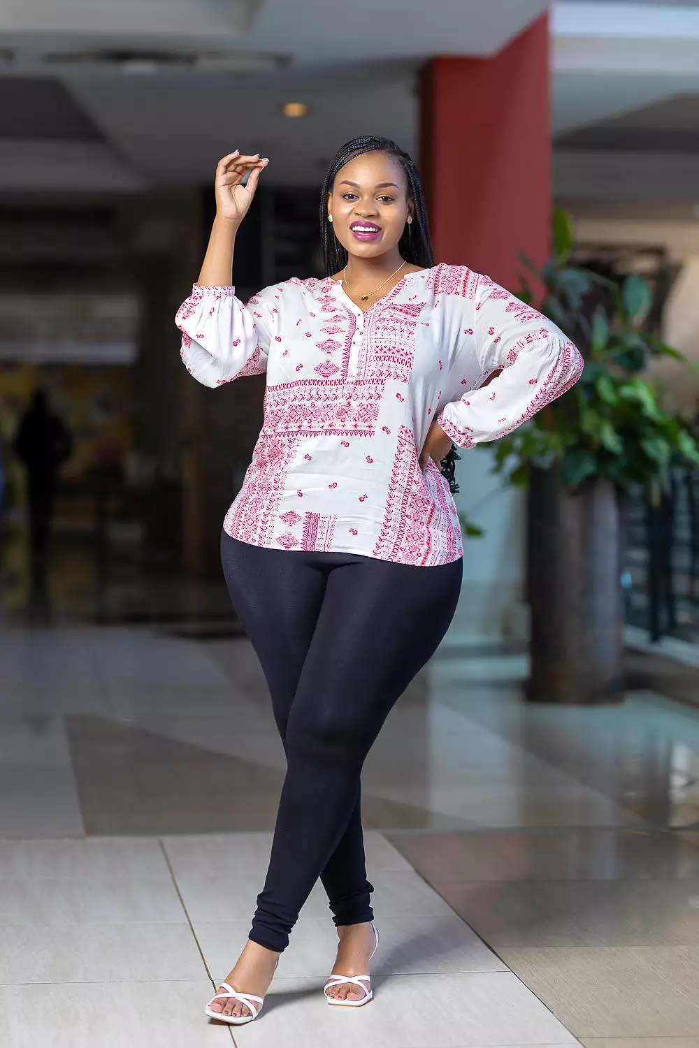 Red and white long sleeved top