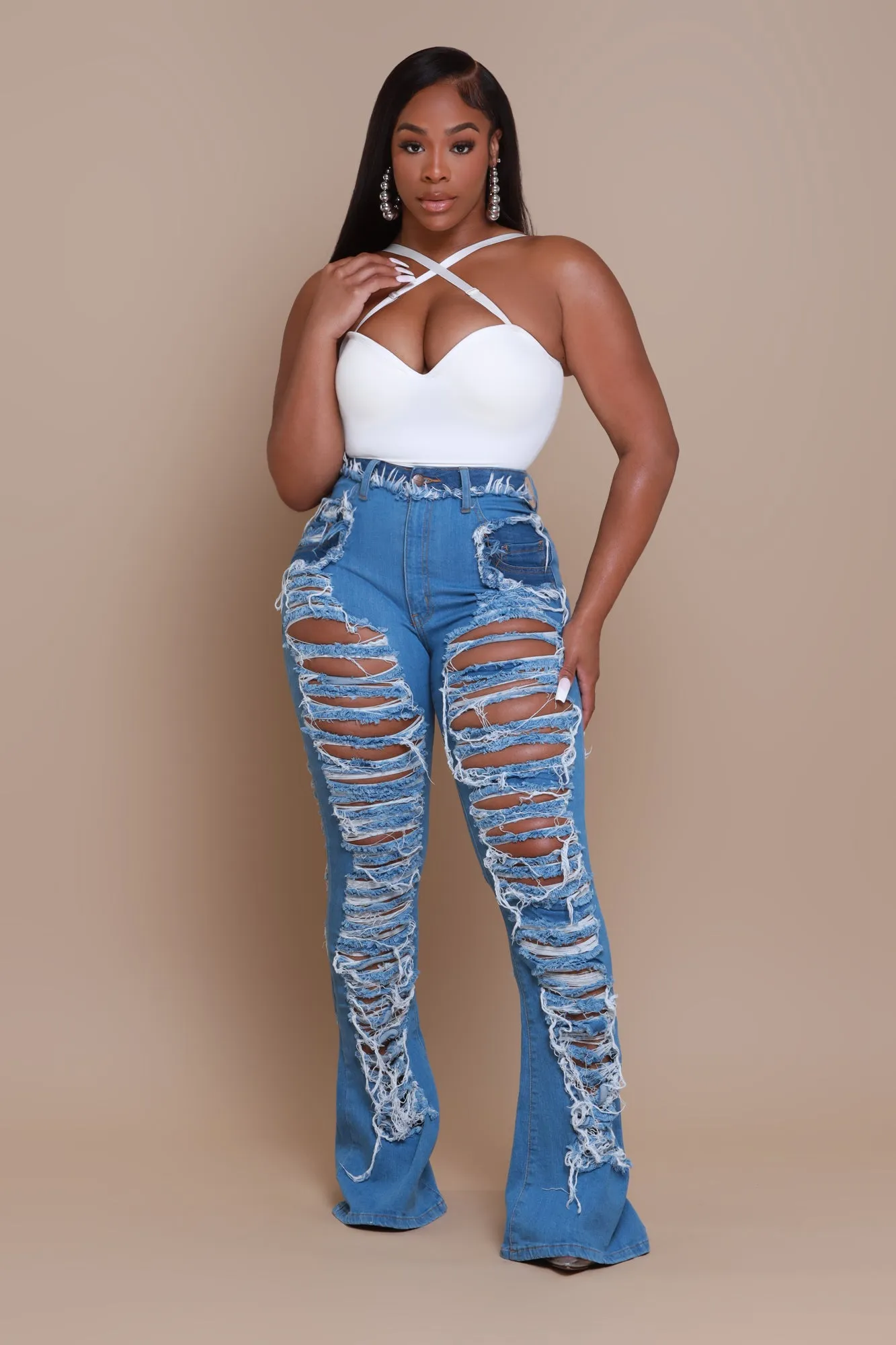 Side Step High Rise Distressed Flare Jeans - Med Wash