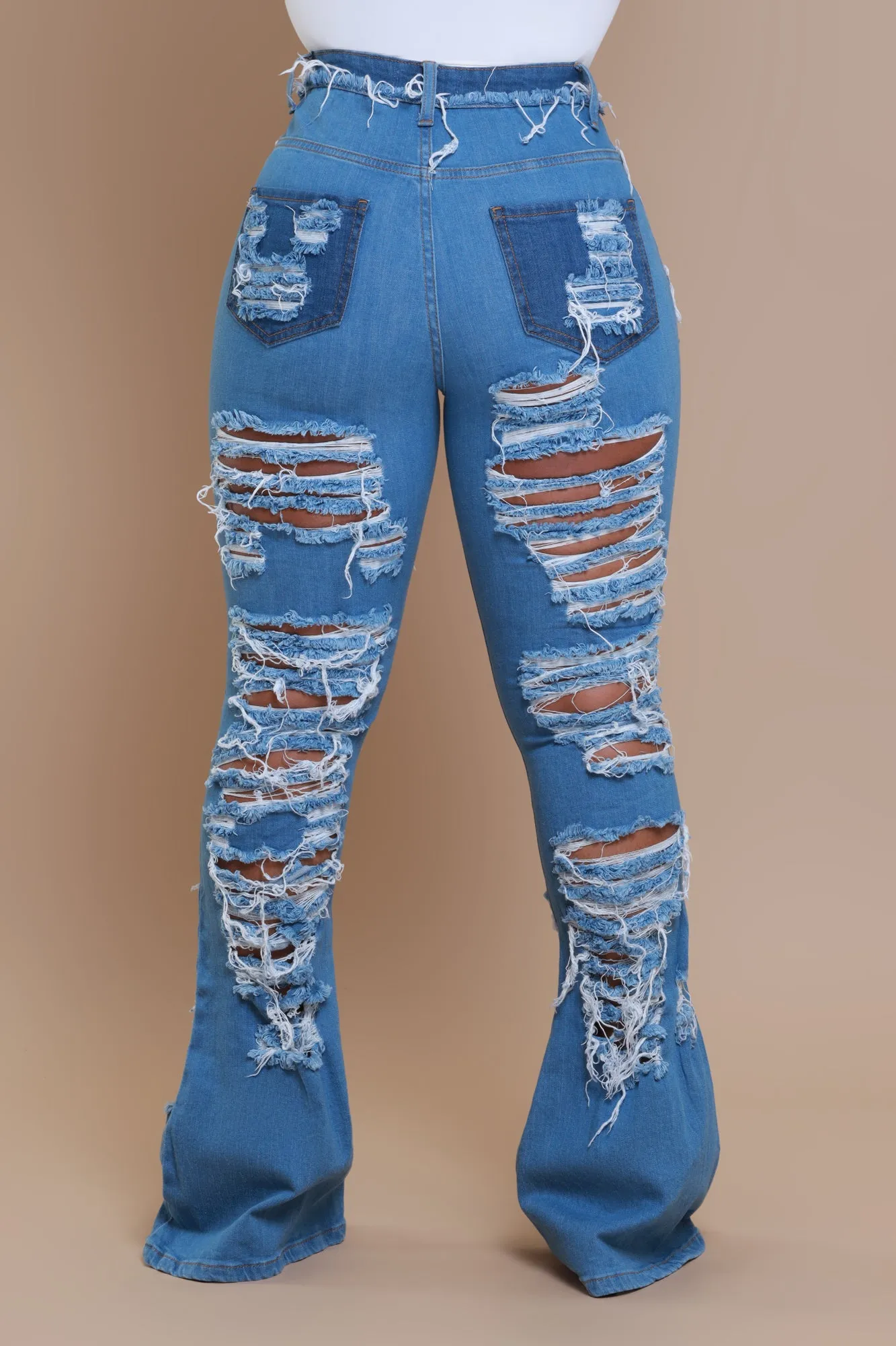 Side Step High Rise Distressed Flare Jeans - Med Wash