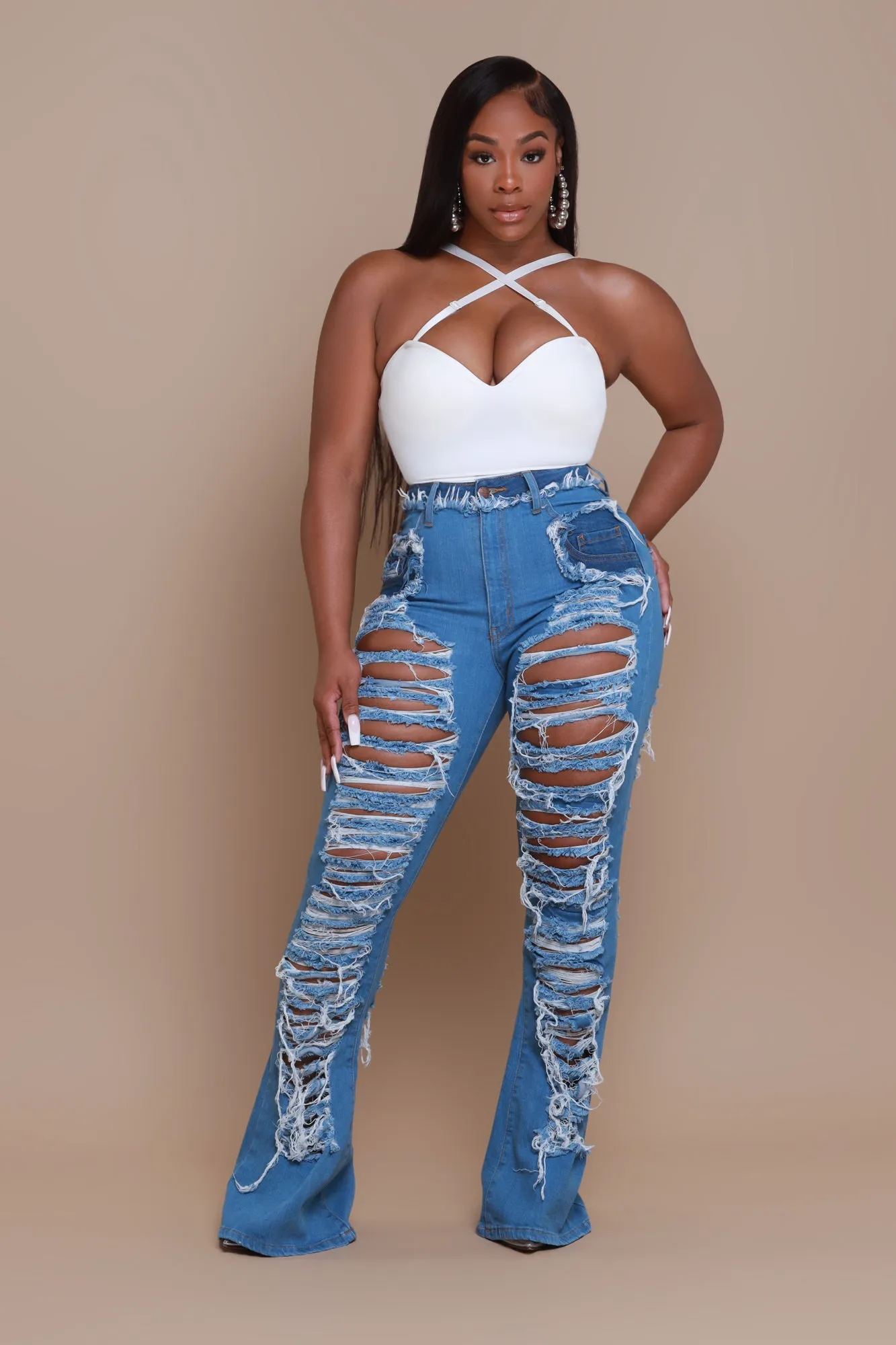 Side Step High Rise Distressed Flare Jeans - Med Wash