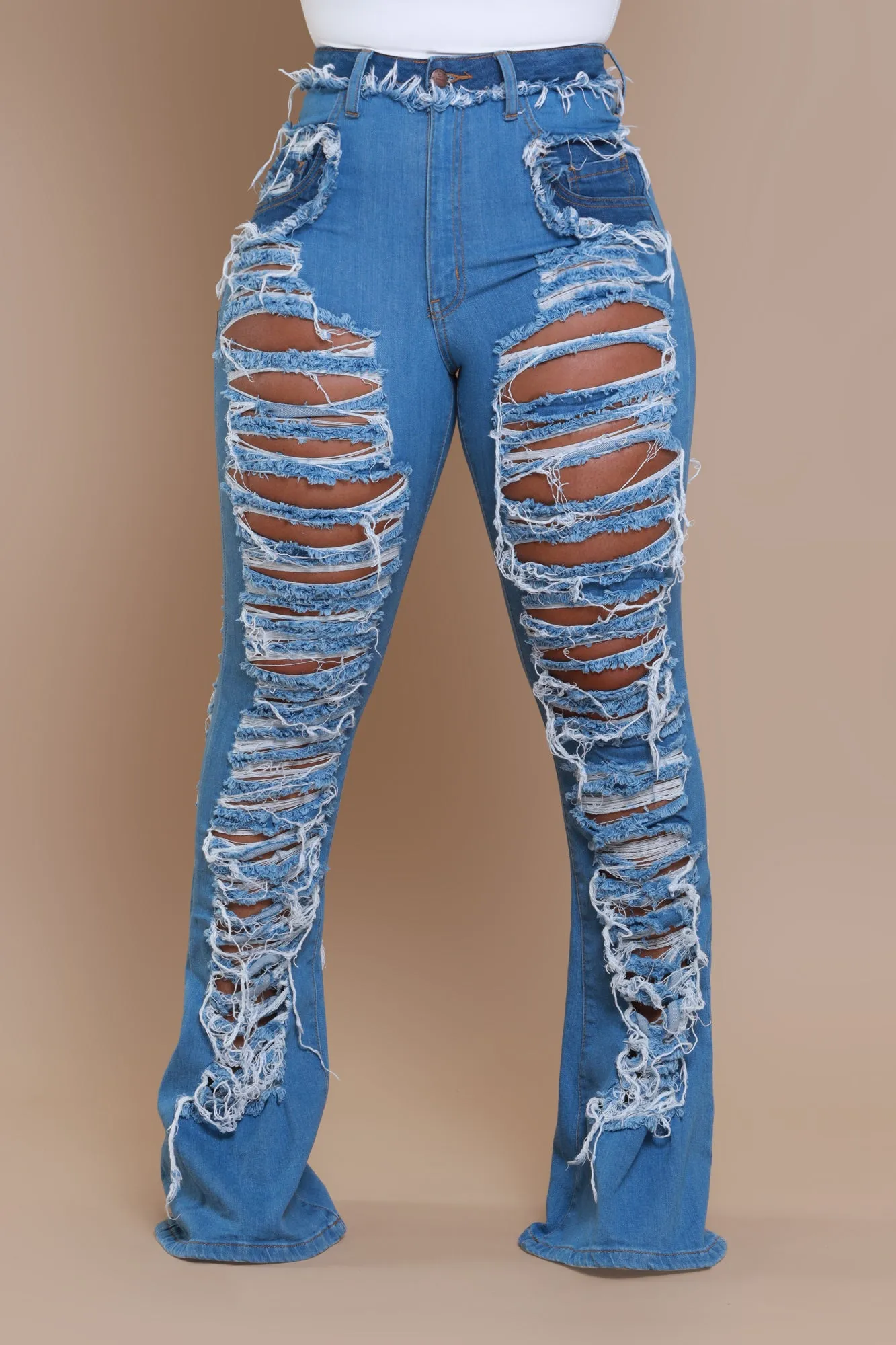 Side Step High Rise Distressed Flare Jeans - Med Wash