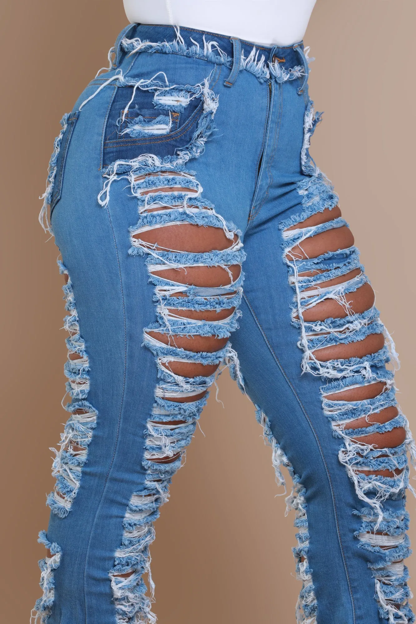 Side Step High Rise Distressed Flare Jeans - Med Wash