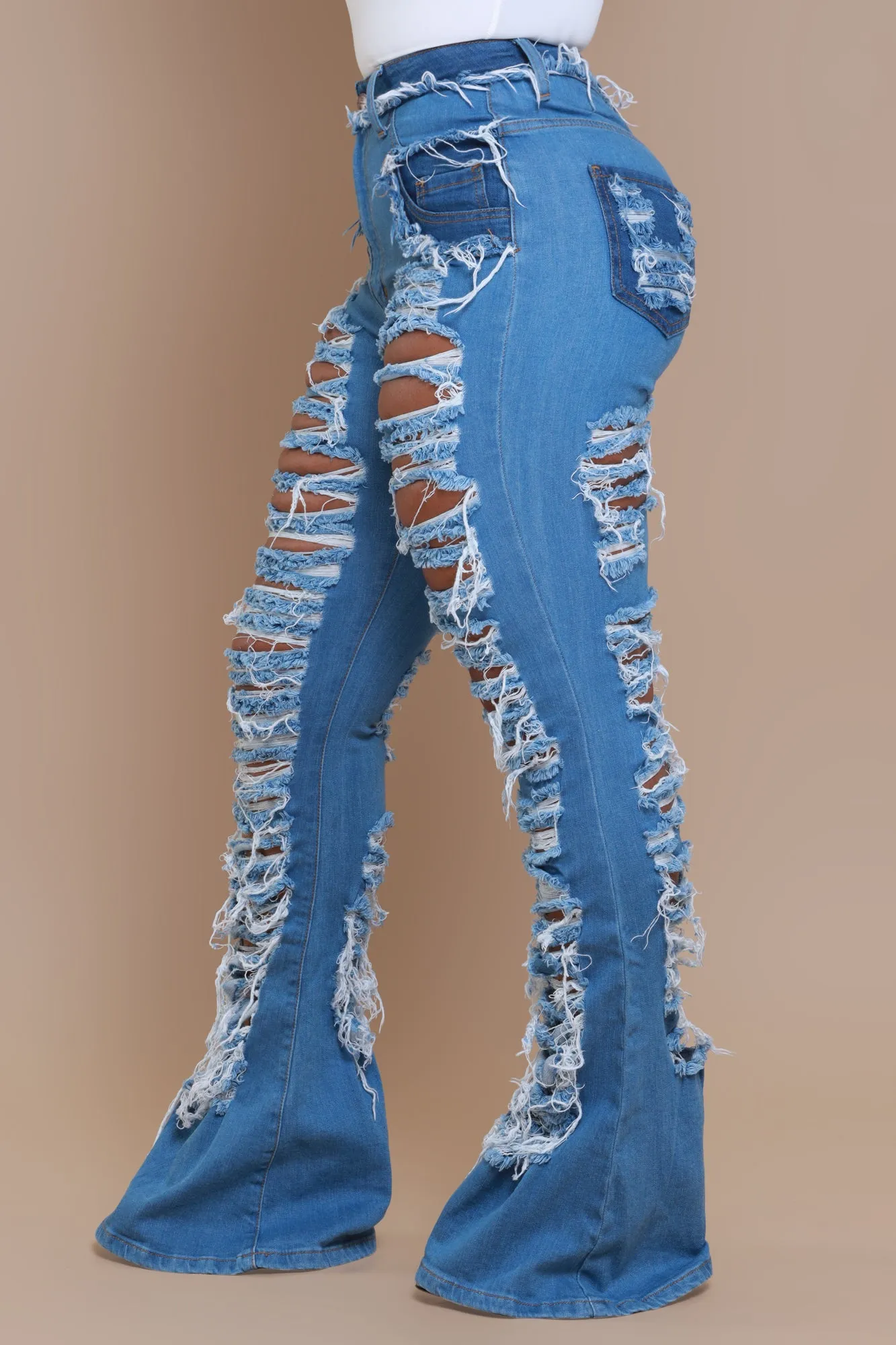 Side Step High Rise Distressed Flare Jeans - Med Wash